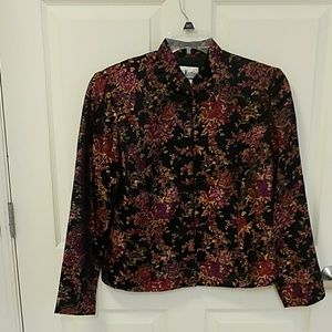 Women's size M lined it. Blazer like jacket.